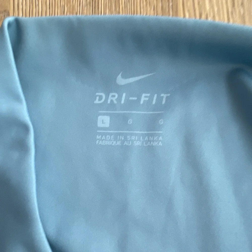 Nike Yoga Dri-FIT High Rise 7/8 Ankle Leggings L Blue‎ Solid Logo